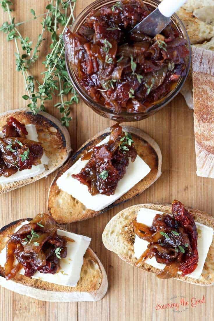 Bacon onion tomato jam is the perfect addition to any charcuterie board. This recipe is the perfect combination of sweet and savory. A hint of thyme balances out the trio of flavors. A staple for your refrigerator or a lovely gift to give as a hostess gift or to friends and family at the holidays.
