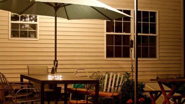 Make your outdoor patio more of an outdoor room by defining the ceiling with bistro lights. But what if you don't have a pergola or trees to attach the lights to? Here are instructions on how to create DIY bistro light patio planters. Further define and personalize your outdoor space with beautiful flowers in the patio planters.