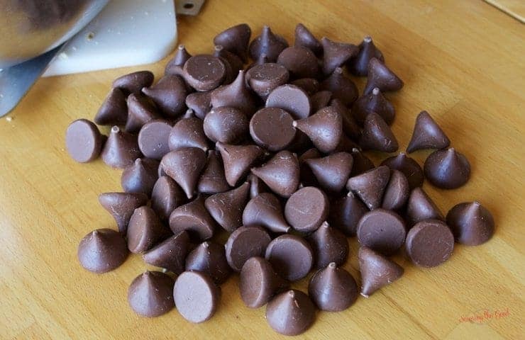 unwrapped hershey kisses in a pile on the table