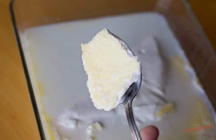 clotted cream on a spoon