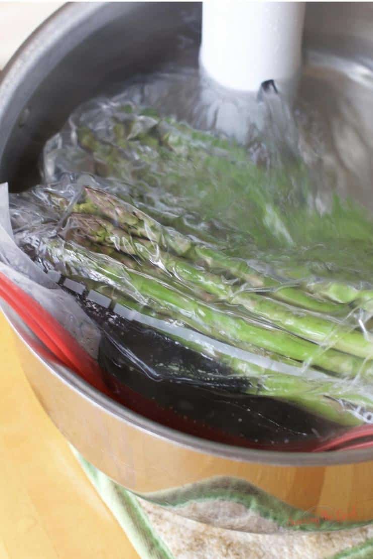 asparagus in a sous vide water bath 