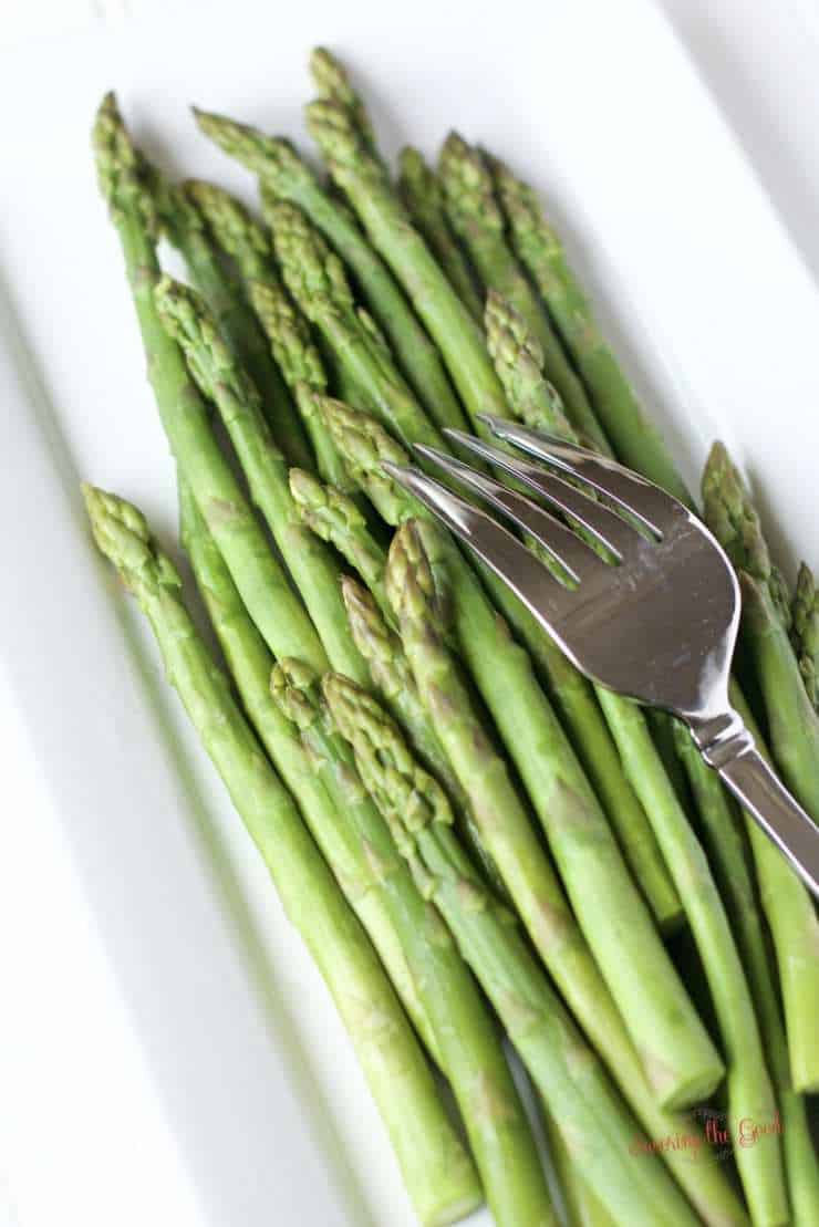 sous vide asparagus on a white plate
