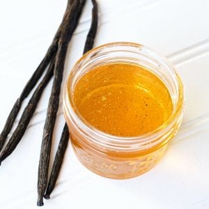 Vanilla bean honey is a beautiful balance of warm vanilla and sweet. Easily infuse vanilla bean honey with the help of sous vide in hours, instead of weeks. Start with this honey infusion recipe and you will be inspired to create other infused honeys. Try this vanilla bean infused honey in iced tea, in cocktails or on scones at tea time. #infusedhoney #honey #vanilla #vanillabean #sousvide #sousvideinfusion