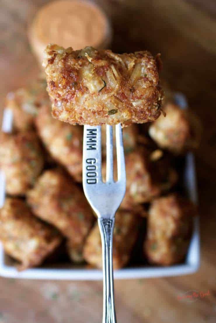 rueben tater tots on a silver fork