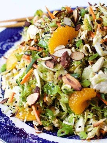 An Asian ramen noodle salad with oranges and almonds.