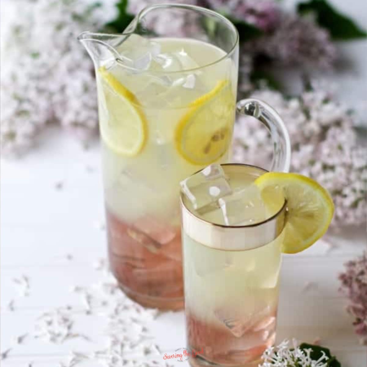 Lilac Lemonade in a glass pitcher