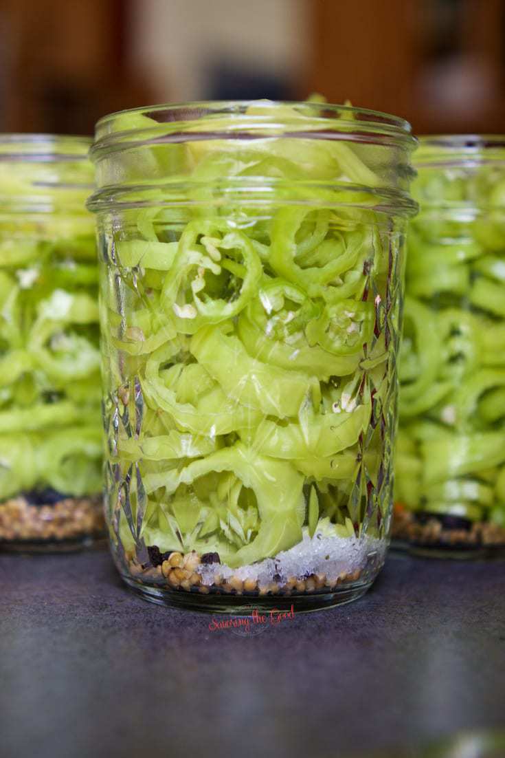 Banana peppers packed in a canning jar