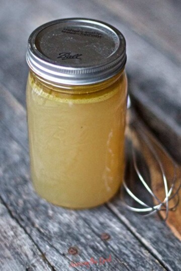 homemade turkey stock in a quart canning jar