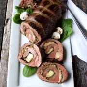 sous vide stuffed flank steak with steak pinwheels cut for a party