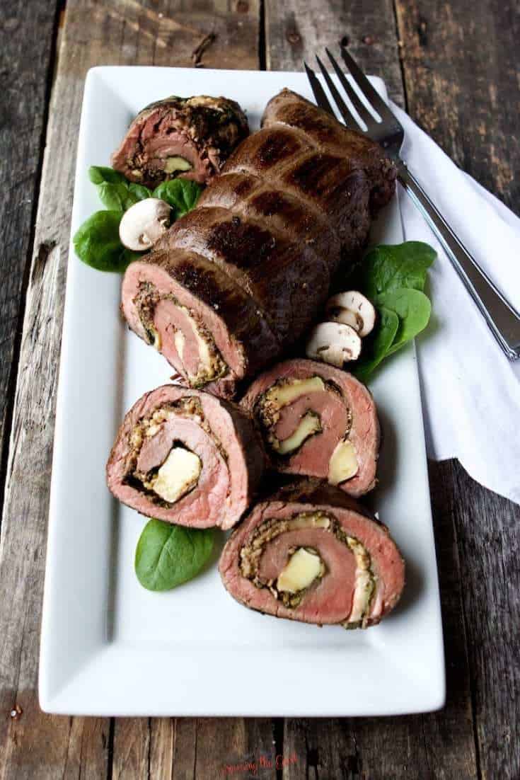 sous vide stuffed flank steak with steak pinwheels cut for a party