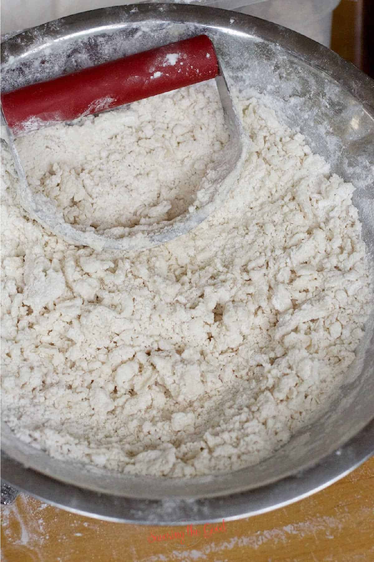 flour and crisco cut together for pie dough, pastry blender with red handle