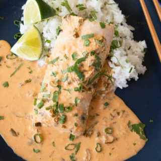 Sous Vide Mahi-Mahi with Thai Coconut Curry Sauce on a blue plate with white rice