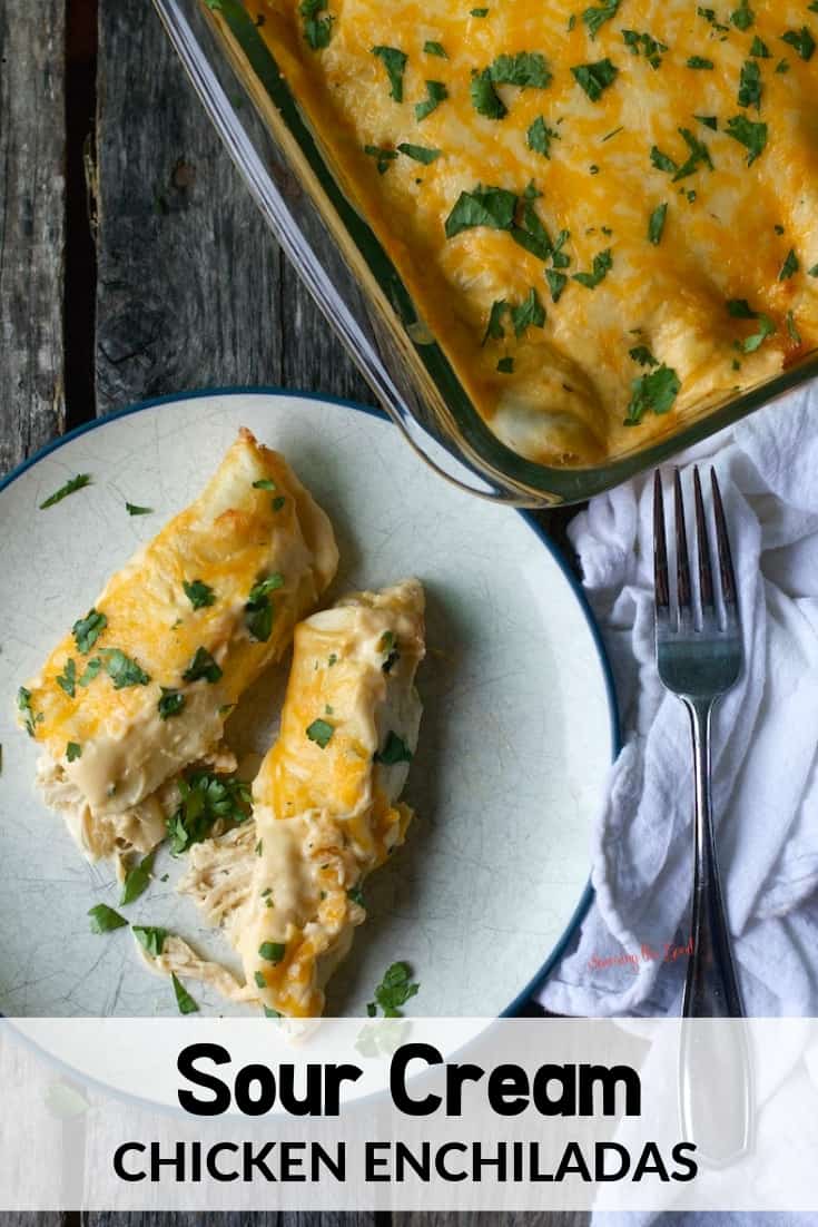 sour cream chicken enchiladas on a plate with text at the bottom for pinterest