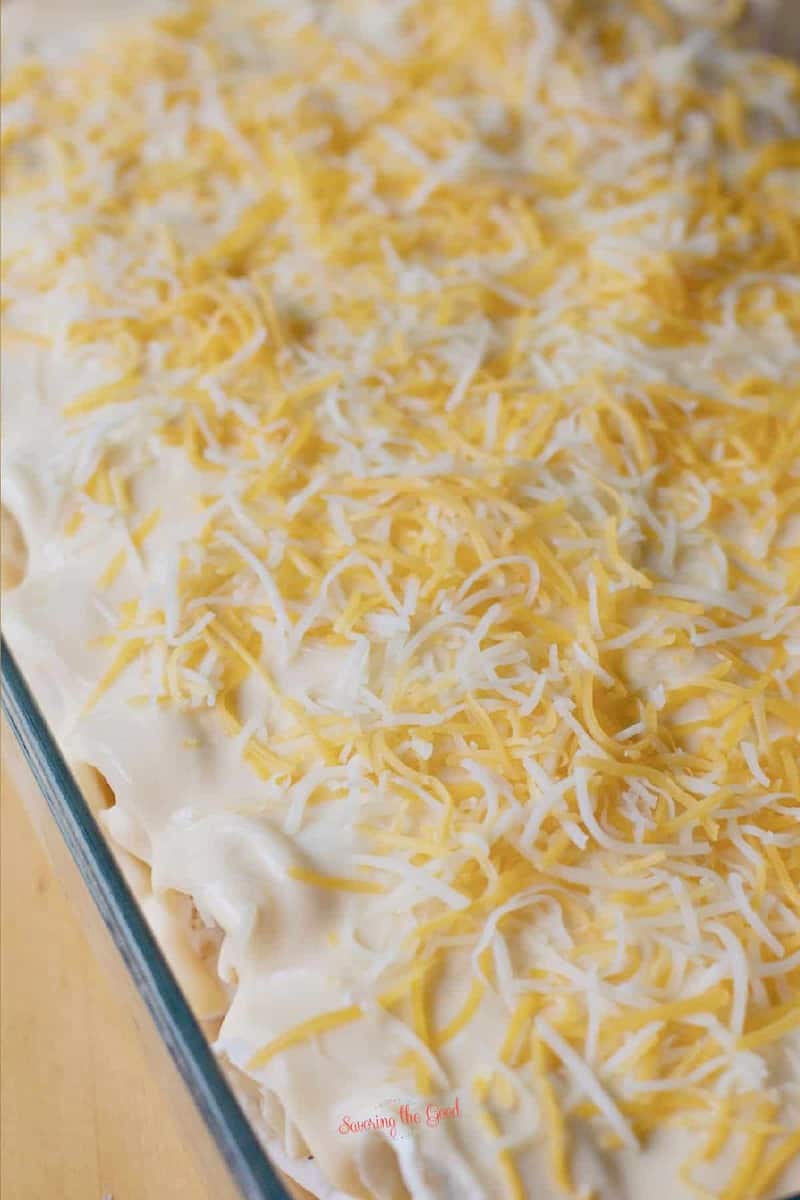 close up of sour cream chicken enchiladas before they go in the oven.