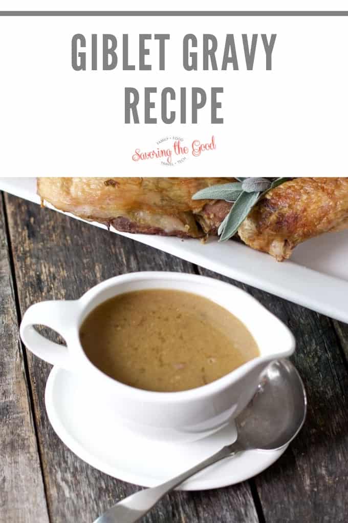 Giblet gravy recipe served on a white plate with a bowl of homemade gravy.