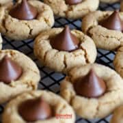 Hershey Kiss cookies on a cooling rack.
