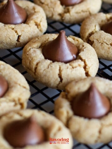 Hershey Kiss cookies on a cooling rack.