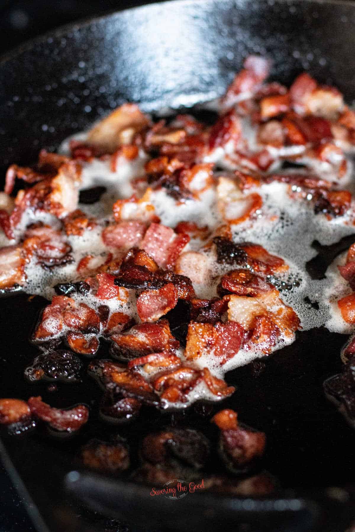 bacon crisping in a hot cast iron pan