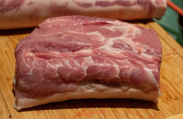 Raw pork loin on a cutting board