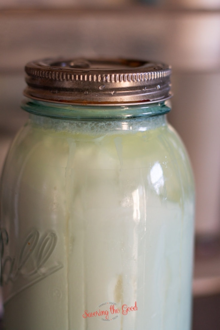 Sous Vide Yogurt in a quart jar showing the whey separating from the curd