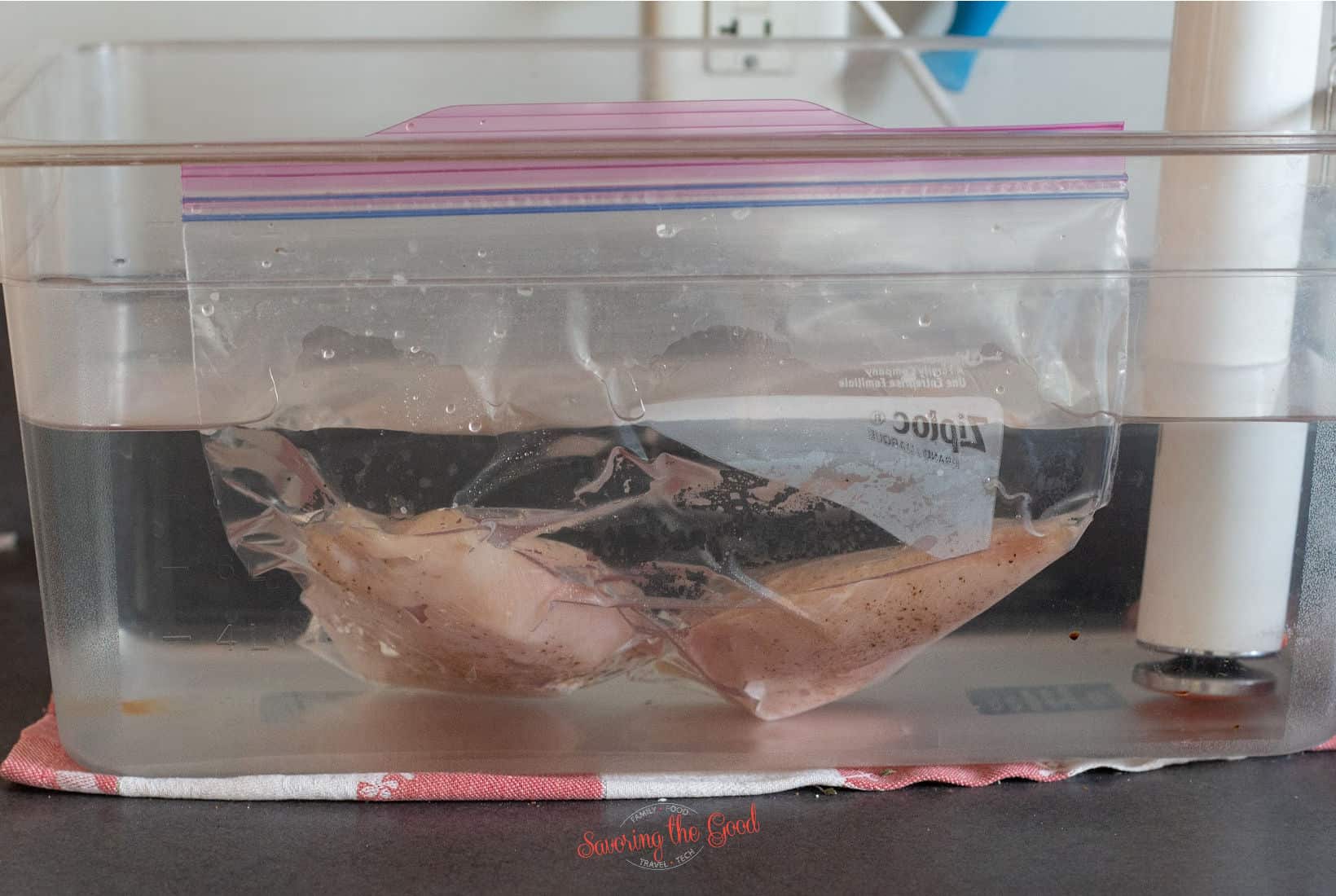 chicken breasts in ziploc bag in a sous vide waterbath