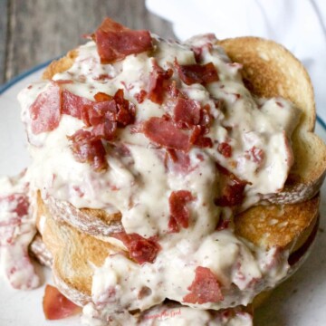 Chipped Beef On Toast stacked on a plate