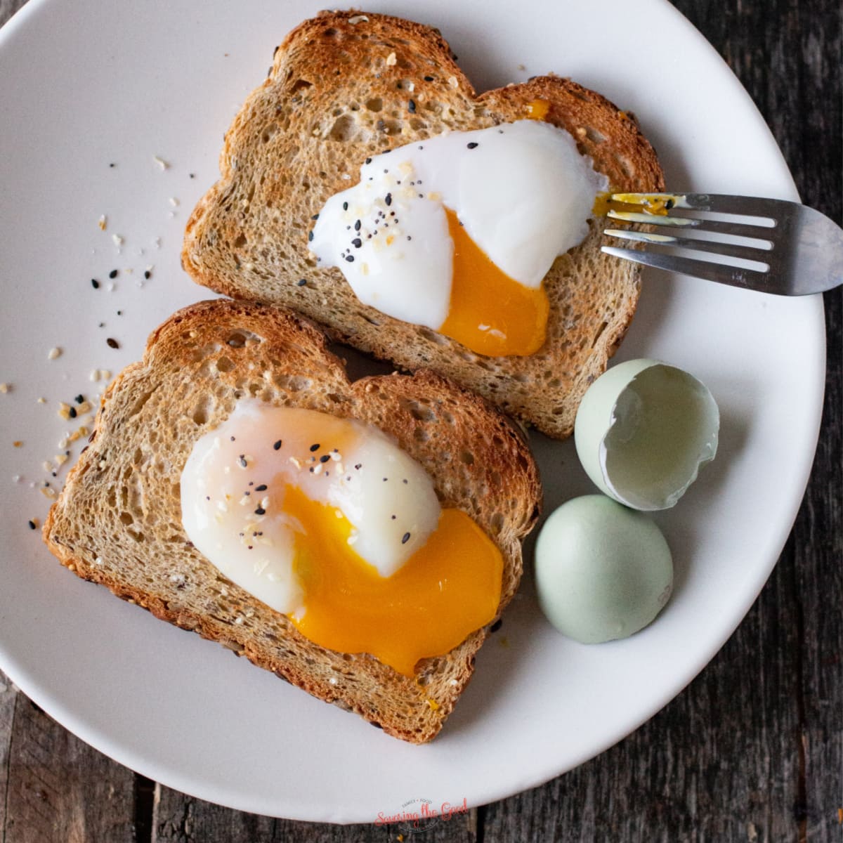 Sous vide eggs on toast, broken to show the runny yolk