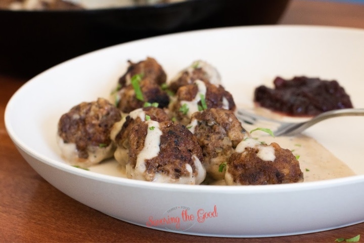 swedish meatballs with gravy on a plate