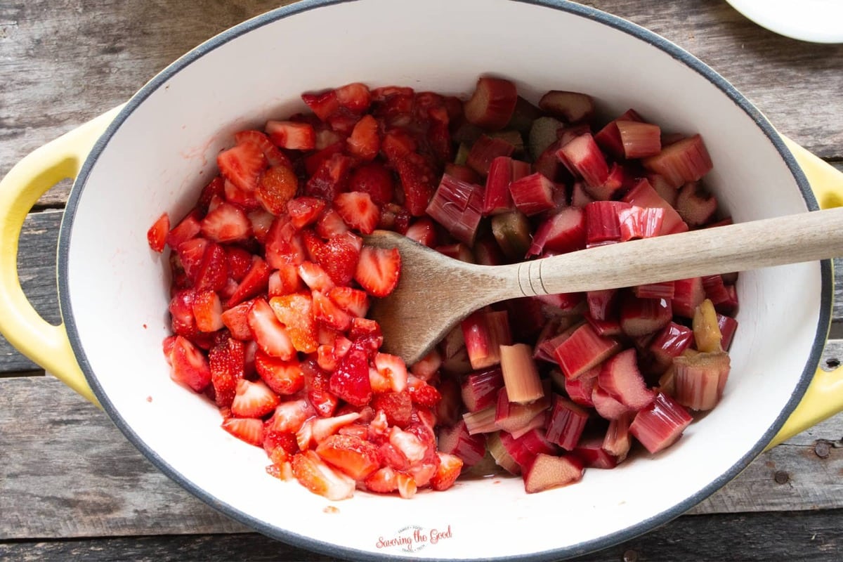 strawberries and rhubarb in a pan for jam