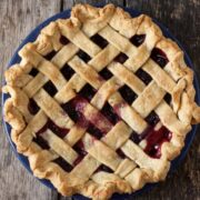 Black Raspberry Pie baked in a blue pie plate