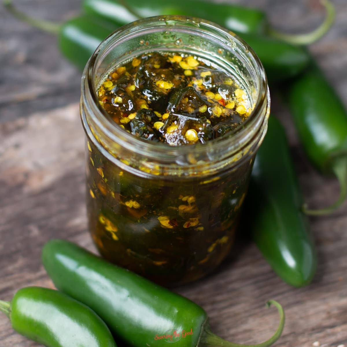 candied jalapenos recipe in a canning jar square image