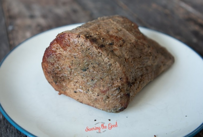 sous vide chuck roast patted dry after cooing, on a plate