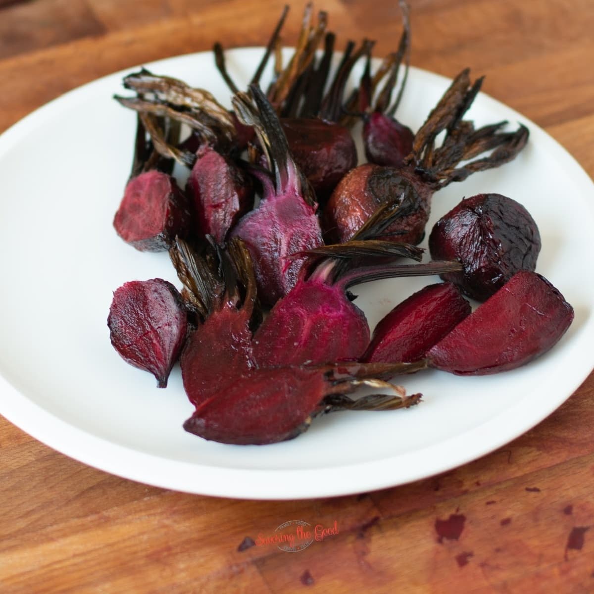 roasted whole beets on a plate
