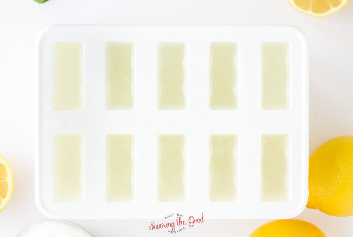 Lemonade Popsicle juice in popsicle molds birds eye view