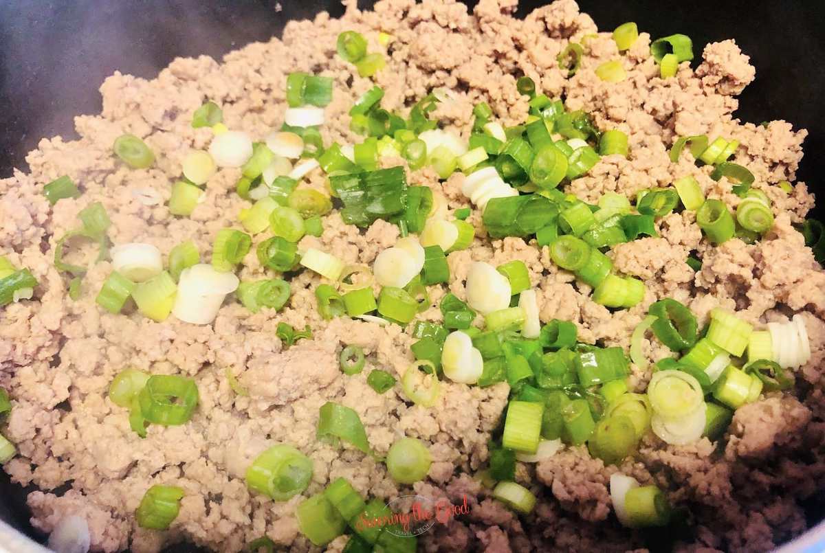adding the green onions