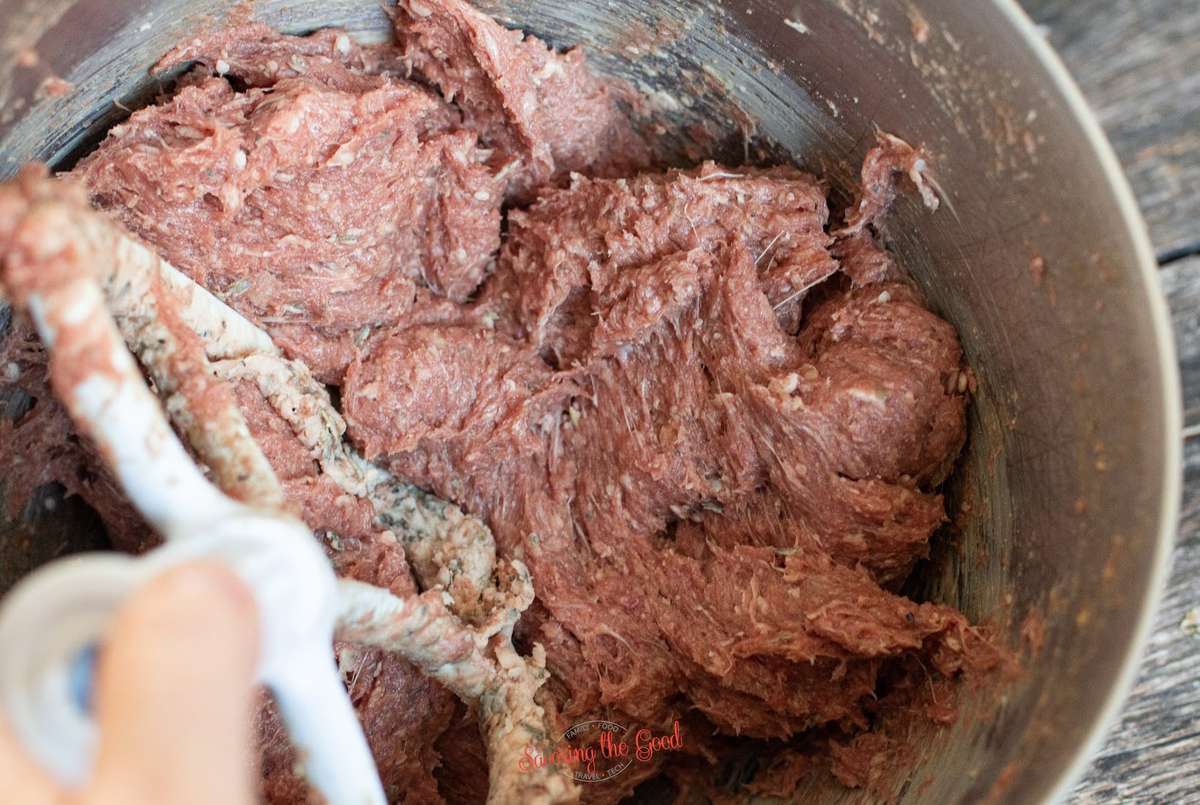 mixing gyro meat in a mixing bowl