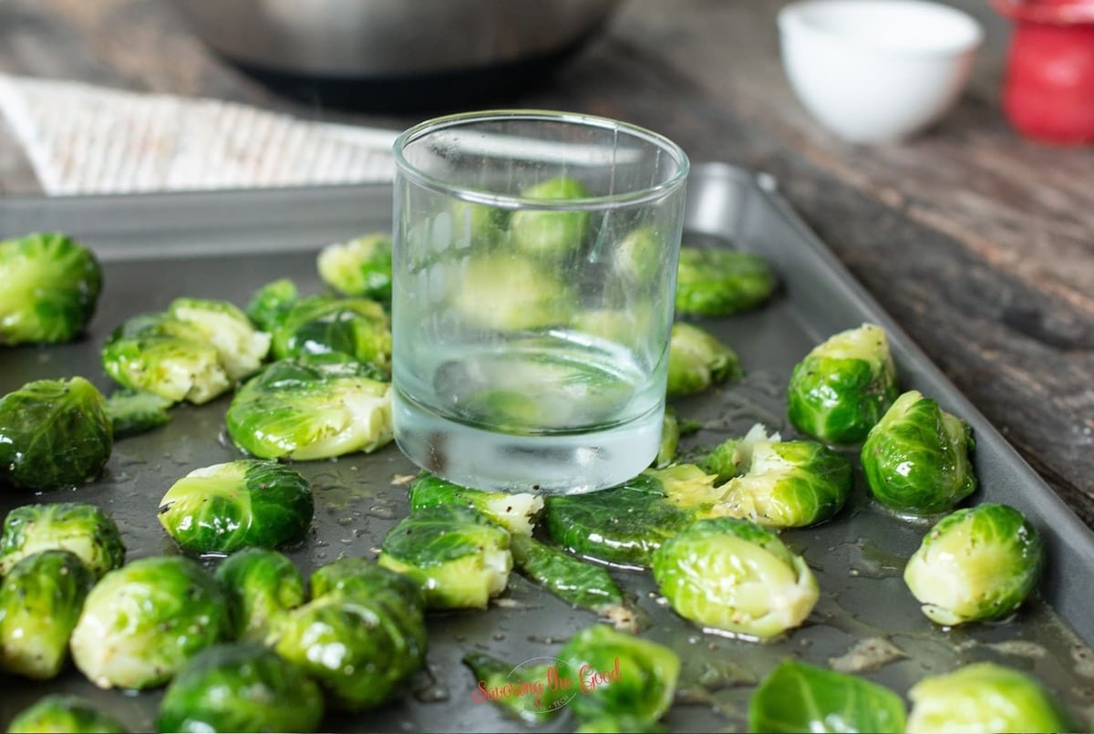 a glass smashing brussels sprouts