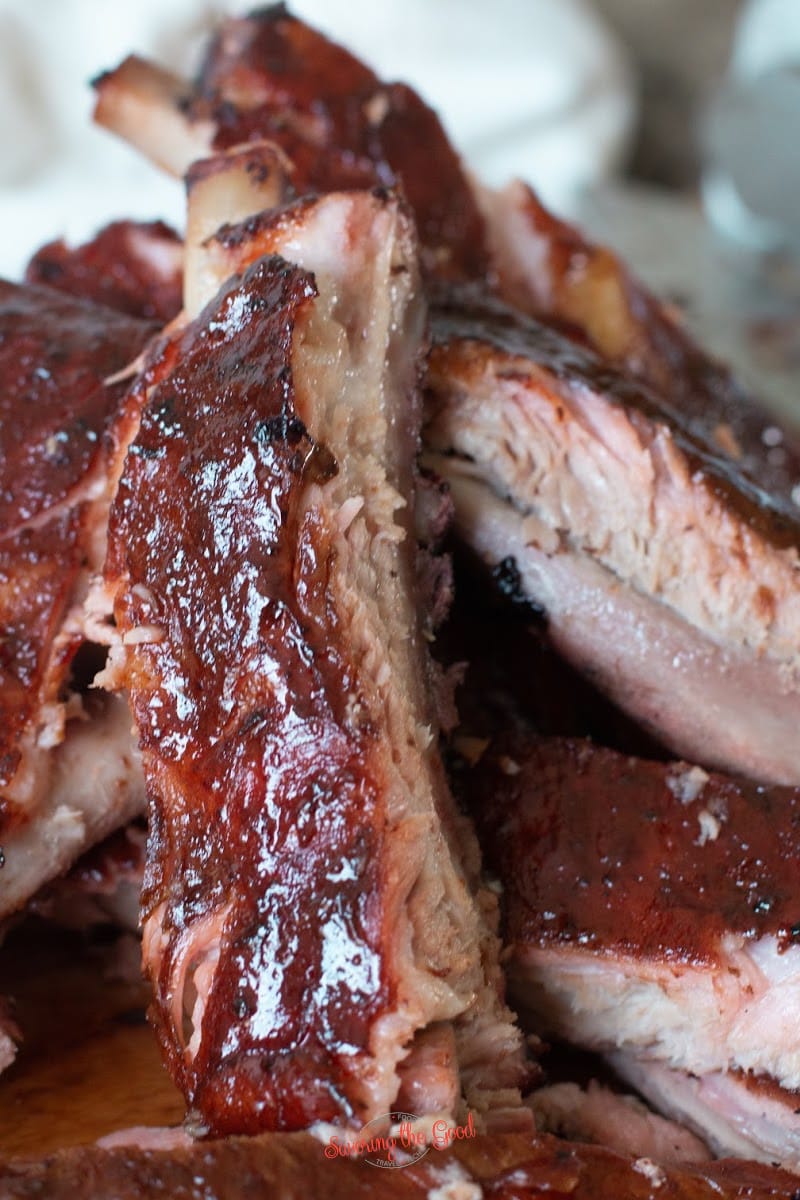 tight shot of sous vide pork ribs with sauce
