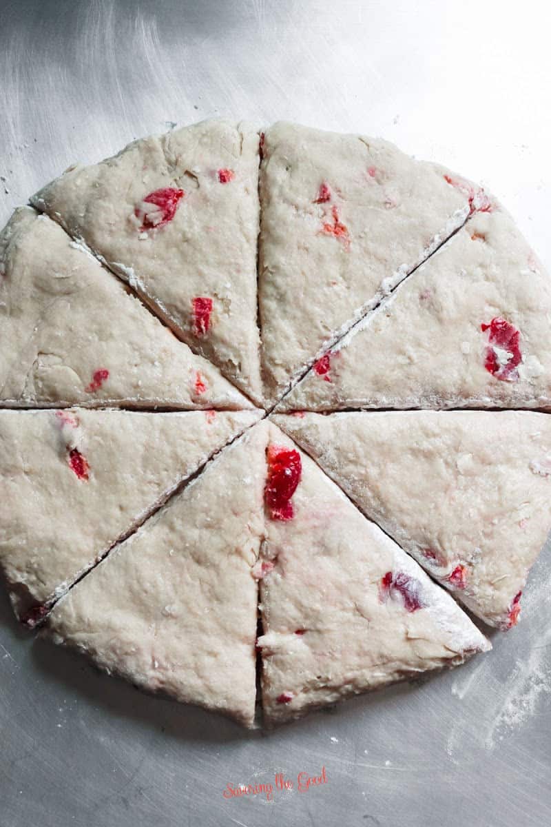 disk of cherry scones cut into 8 triangles