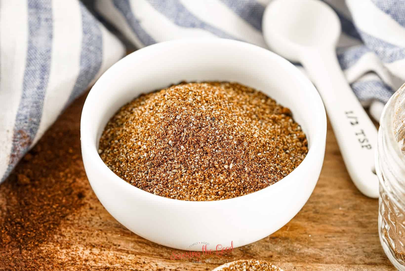 top down image of Homemade Chili spice mix in white bowl.