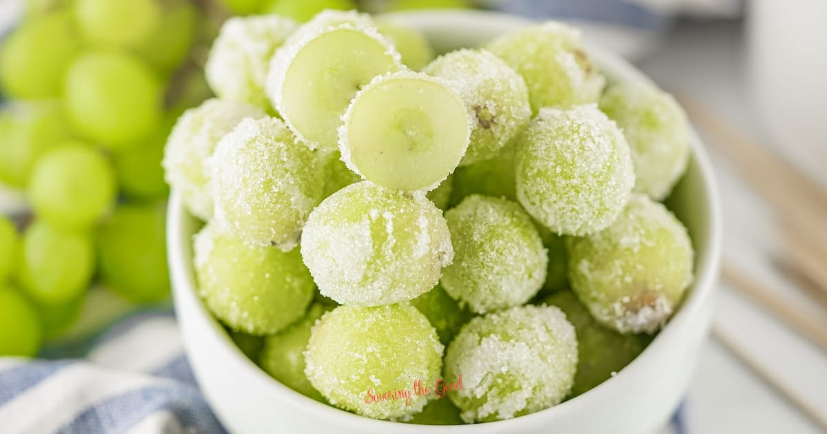 sugared grapes in a white bowl .
