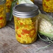 corn relish recipe with peppers and celery in a canning jar