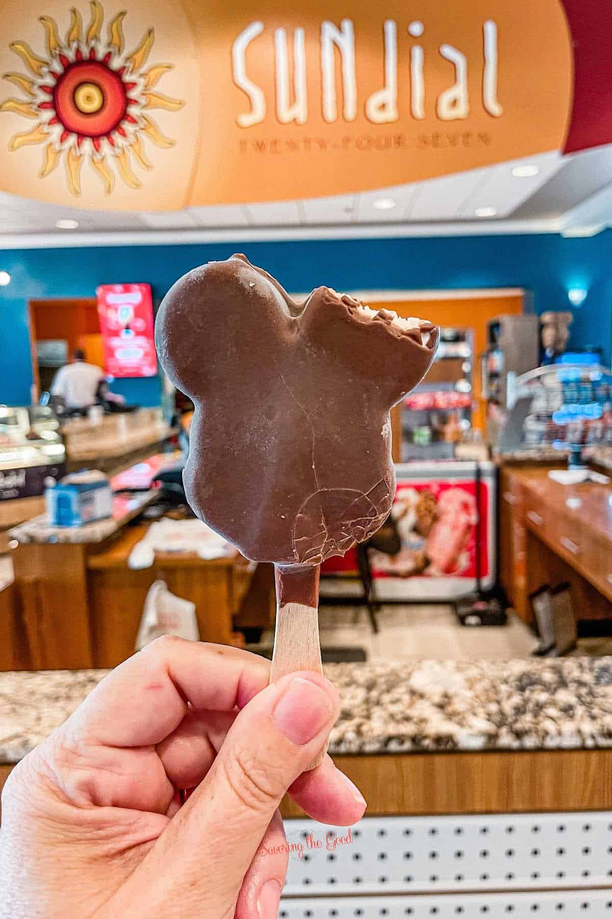 mickey icecream bar with a bite taken out of it