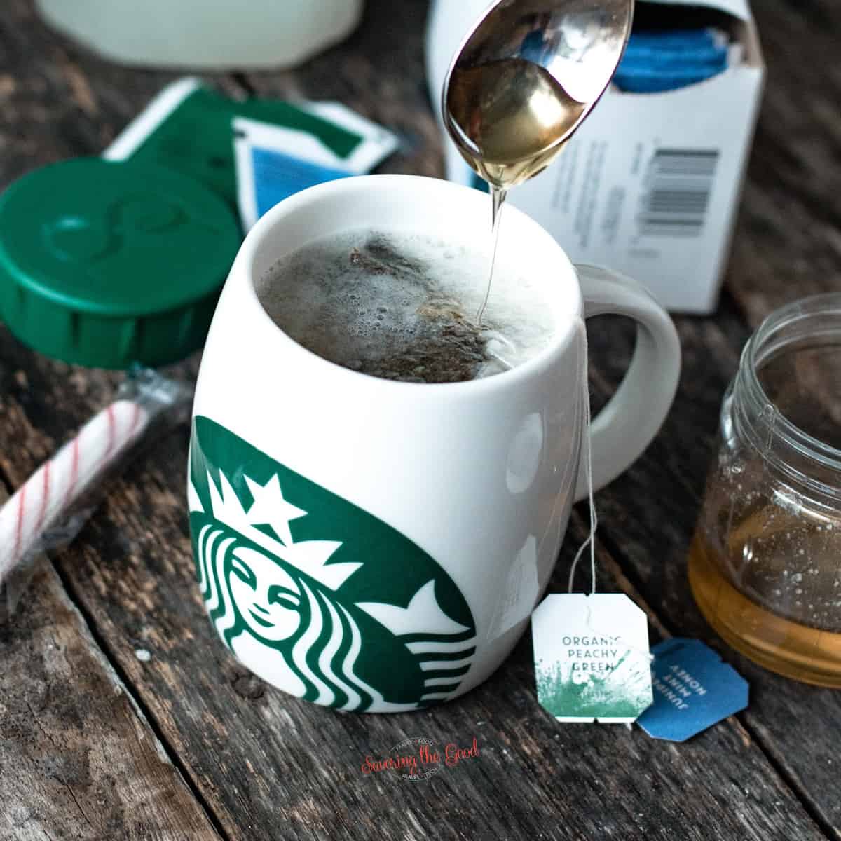 starbucks medicine ball tea.
This Starbucks medicine ball tea contains Jade citrus mint tea, honey citrus mint tea, peach tranquility herbal tea (both Teavana) steamed lemonade, honey, and an optional pump of peppermint syrup.