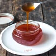 homemade Hot Honey being poured off a spoon