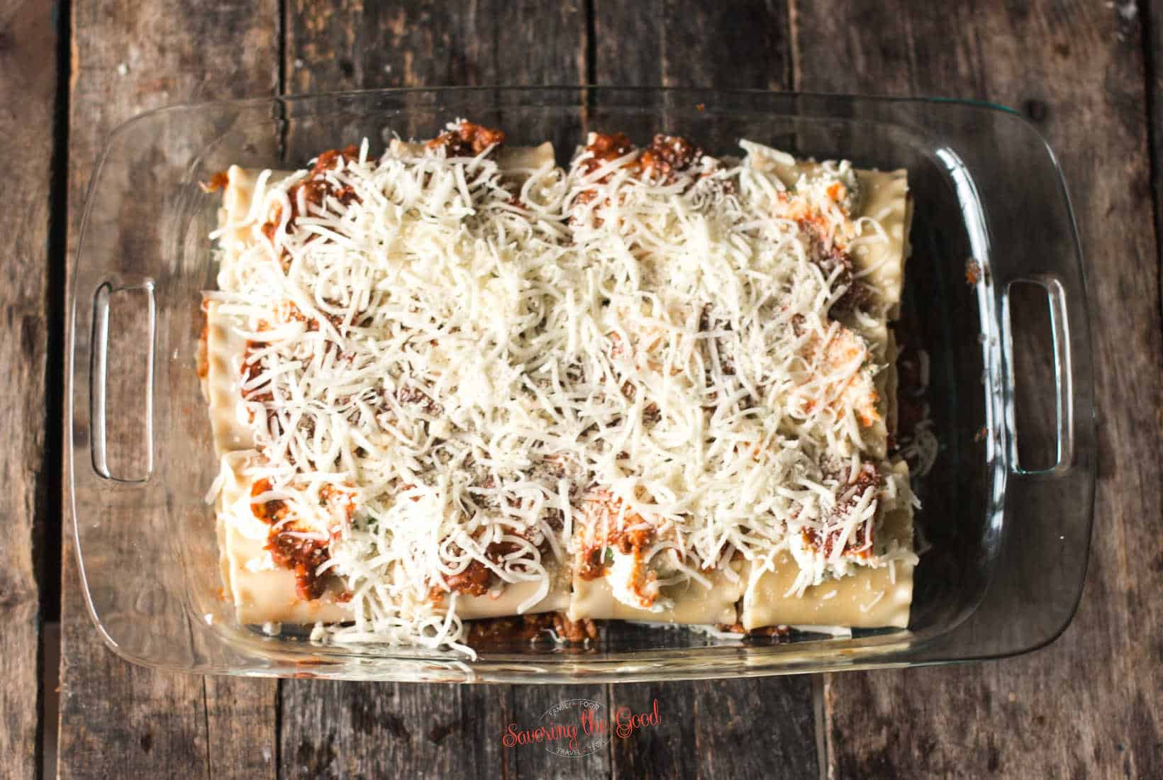 lasagna roll ups covered in mozzerella cheese
