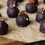 Bourbon Balls Kentucky version with pecan garnish