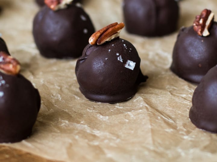 Bourbon Balls Kentucky version with pecan garnish