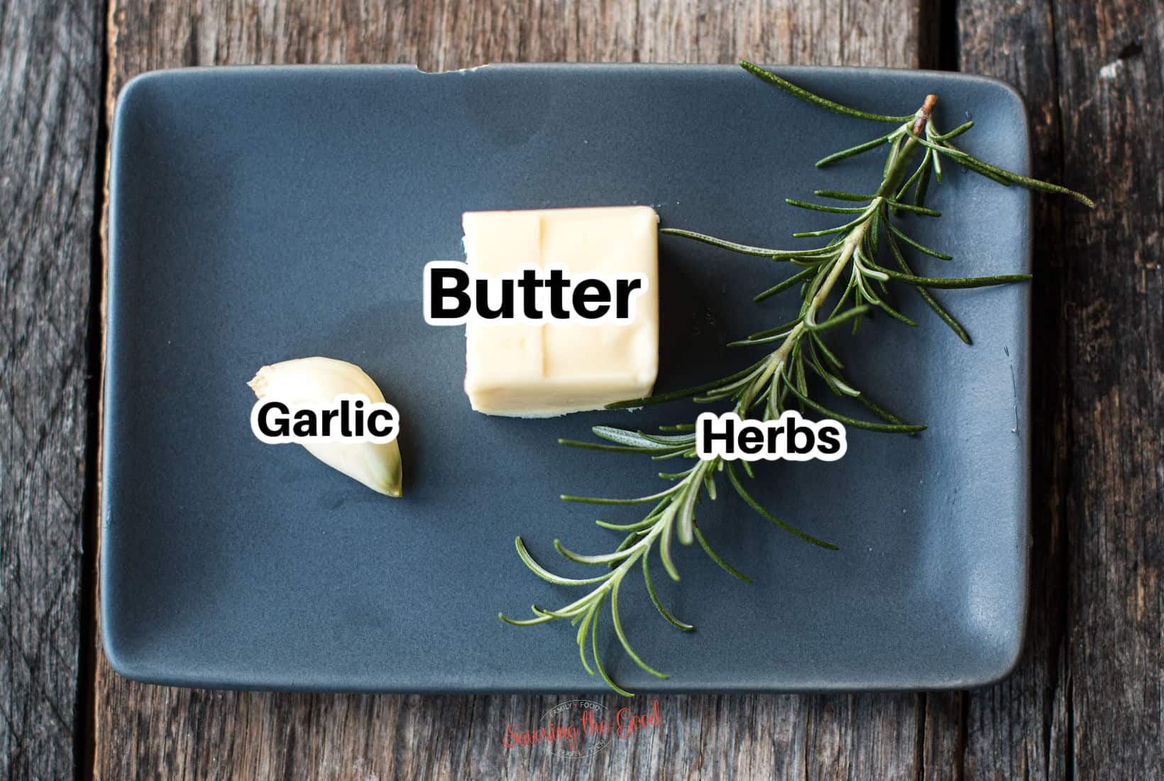 sauce ingredients with text overlay, garlic clove, butter, herbs.