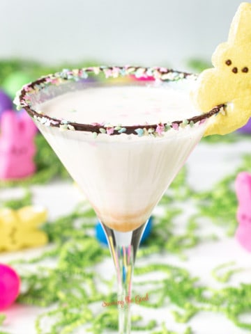 easter cocktail with marshmallow peep garnish.